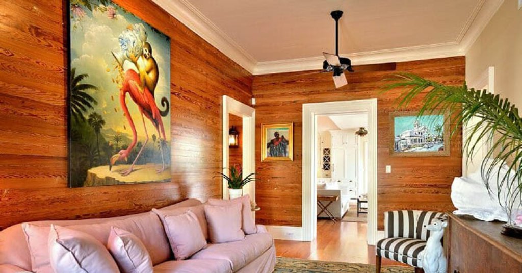 Dade County Pine interior with solid wood wall paneling.