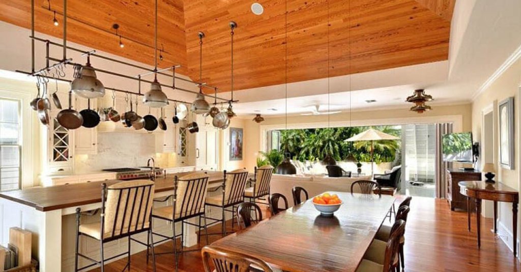 Dade county pine in a kitchen setting with ceiling paneling.